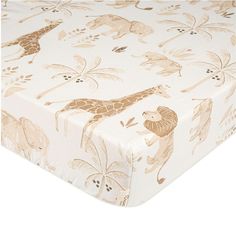 an image of a baby crib sheet with giraffes on it