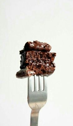 a piece of chocolate cake on a fork