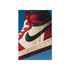 Elevate your sneaker collection with this stunning poster featuring a close-up of a red and white Nike Dunk with a black swoosh. This high-quality print captures the iconic design of the Nike Dunk in all its glory, showcasing the sleek lines, bold colors, and unmistakable style that have made it a favorite among sneakerheads for decades. Crafted with meticulous attention to detail, this poster is printed on premium matte paper, ensuring that the colors and details pop and that it will look great for years to come. Whether you're a die-hard Nike fan or simply appreciate great design, this poster is the perfect addition to your home or office decor. Hang it in your bedroom, living room, or office to show off your love of sneakers and add a bold, eye-catching accent to any space. Or, give it Office Decor Modern, Hypebeast Art, Custom Poster, Art Office, Print Wall Decor, Red Nike, Shoe Art, Custom Posters, Sneaker Collection