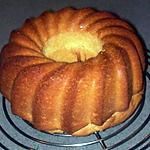 a bundt cake sitting on top of a metal rack