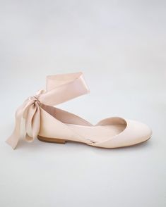 Smooth satin round toe flat. Inspired by a contemporary and refined designed ballet flat. Style as with a delicate loop of ribbons around the ankle and tie into a back bow. Choose from silky satin ribbon or sheer ribbon ties. The perfect shoe for a fall or summer wedding, bridesmaids, bridal parties, holiday, or evening shoes. DETAILS: UPPER: Synthetic upper and lining MATERIALS: Manmade outsole Imported Materials STYLE NAME: GLORIA Not sure of which size to purchase? Shoes measurements are as follow: (Please note measurements taken the length of inside of shoe from toe to heel) WOMEN SIZE: Size 6:  9.375 inches Size 7:  9.875 inches Size 8:  10.25 inches Size 9:  10.5 inches Size 10:  10.875 inches Size 11:  11.25 inches - We DO NOT offer refunds.  Selected items are eligible for EXCHANGE Summer Wedding Bridesmaids, Fall Wedding Shoes, Shoes Details, Women's Slip Ons, Bridal Flats, Evening Flats, Bridal Parties, Bridesmaid Shoes, Bride Shoes