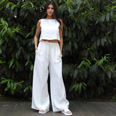 Introducing our gorgeous White Organic Wide Leg Linen Pants, Chakra, handmade with love and precision from 100% organic linen in Istanbul. These luxurious palazzo-style pants are perfect for all occasions, providing both comfort and sophistication to your wardrobe. Accentuate your feminine curves with our elastic waistband trousers, featuring a drawstring to tailor-fit to your liking. Two hip pockets are crafted for added convenience, making sure you don't compromise functionality. Perfect for h Wide Linen Pants, Linen Palazzo Pants, White Linen Trousers, Wedding Pants, Wide Leg Linen Trousers, Palazzo Style, Linen Top Women, Set Plus Size, High Waisted Wide Leg Pants