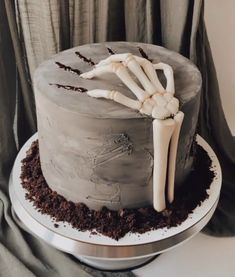 there is a cake that has been decorated with bones