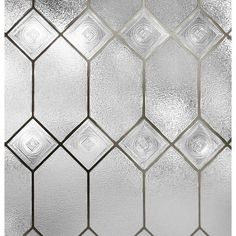 an image of a glass tile pattern that looks like hexagonals on the wall