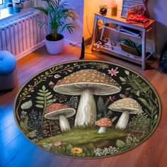 a rug with mushrooms on it in the middle of a room next to a table