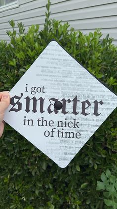 someone is holding up a sign that says i got smarter in the nick of time