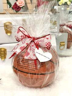 a basket filled with lots of different types of items on top of a white table