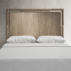 a bed with white pillows and wooden headboard in a minimalistic bedroom setting, 3d rendering