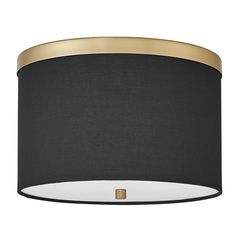 a black and gold drum light fixture