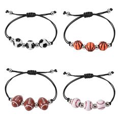 four different bracelets with balls and basketballs on the string, one is black