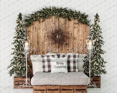 a bed made out of wooden pallets with christmas decorations on the headboard and pillows