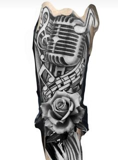 a black and white drawing of a microphone with a rose on it's side