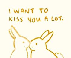 a drawing of two rabbits with the words, i want to kiss you a lot