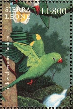 a postage stamp with two green birds on it's front and the words sierra leone