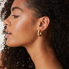 If there is one trend that you NEED to jump on the bandwagon for, it’s chunky hoops earrings. These hoops are so perfectly thick, beautiful, and everything you need in a hoop earring. Pop these on with absolutely anything and completely transform your look. Materials 925 Sterling Silver post 14K yellow, rose or white gold plated Measurements: Diameter: 30mm (1.18”) ; Width: 6.5mm (.25”) Hypoallergenic; nickel, lead, and cadmium free Chunky Hoops Earrings, High Support Bra, Rose Gold Hoop Earrings, Chunky Hoop Earrings, Dangle Necklaces, Hoops Earrings, Toggle Bracelet, Long Hair Girl, Support Bras