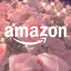 an amazon logo surrounded by pink roses with the word amazon over it's image