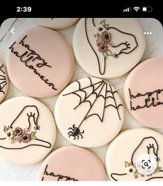 six decorated cookies with handwritten words and flowers on them are arranged in a circle