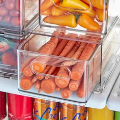 carrots and peppers are in containers on the shelf