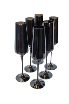 five black wine glasses sitting on top of each other