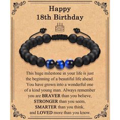 a happy 18th birthday card with two black beads and a blue bead on it