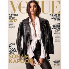 an image of a woman wearing black leather pants on the cover of a fashion magazine