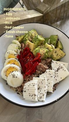 a white bowl filled with different types of food