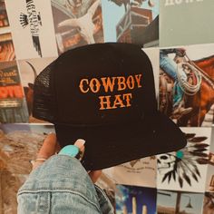 Embrace A Touch Of Western Charm With Our "Cowboy Hat" Trucker Hat! Featuring Embroidered Text For A Subtle Yet Stylish Statement, This Hat Is Perfect For Everyday Wear. Whether You're Running Errands Or Grabbing Coffee With Friends, Add A Hint Of Cowgirl Cool To Your Look With This Effortlessly Versatile Accessory. The Cowboy Hat - Trucker Hat -Cowboy Hat Embroidered -One-Size Fits Most -Mesh Trucker Cap -Trendy Western -Breathable Mesh Back -Adjustable Snap-Back -Wide And Versatile Use -Circum Nashville Trucker Hat, Western Caps For Women, Black Trucker Hat With Short Brim For Rodeo, Black Baseball Cap For Country Events, Casual Hats For Western-themed Events, Casual Cap For Western-themed Events, Casual Western-themed Cap, Western-themed Snapback Trucker Hat, Western-themed Trucker Snapback Hat