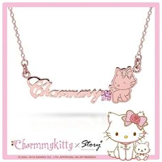 a hello kitty necklace with the name charm on it