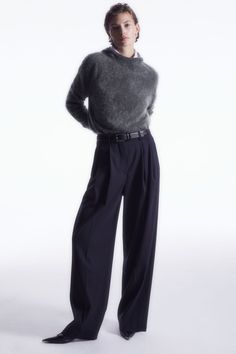 Crafted from pure RWS-certified wool, these wide-leg tailored trousers have been designed to fall loosely over the body. The front pleats and back darts create a flattering silhouette, while the number of pockets make them functional. Concealed inside the waistband is an adjustable-button tab that allows them to be worn low-slung or on the waist.  Relaxed fitHook-and-bar closure, zip flyCertified according to the Responsible Wool Standard, to protect the welfare of the sheep and their environment Shell: 100% RWS Wool, Lining: 100% Cotton / Dry clean Inside leg length of size EU 36 is 76.5cm / Model wears a size EU 36 Quoi Porter, Classic Trench Coat, European Women, Wool Trousers, French Women, Wool Pants, Tailored Pants, On Repeat, Tailored Trousers