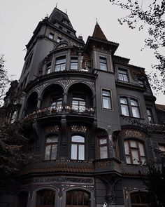 an ornate building with lots of windows and balconies