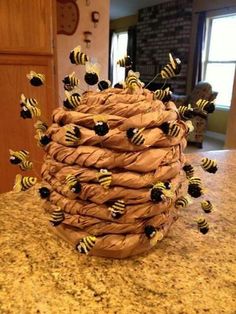 a cake made to look like a bunch of bees