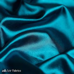 Description Complete your creative projects with our Shiny Stretch Charmeuse Satin Fabric, an exquisite material that combines the luxurious feel of silk with the practicality and versatility of modern fabrics. New Shiny Teal Blue Charmeuse Stretch Satin Fabric by the yard This high-quality imitation silk fabric, measuring 60 inches wide, is perfect for an array of applications, from glamorous dresses to cozy blankets and eye-catching decorations. Crafted with an optimal blend of 98 % polyester and 2% stretch, our fabric offers an unparalleled mix of softness, durability, and elasticity. The high nylon composition results in a smooth, lustrous surface that radiates sophistication and elegance. Meanwhile, the inclusion of spandex provides an incredible 4-way stretch, ensuring the fabric can Fabric Folds, Stretch Satin Fabric, Glamorous Dresses, Faux Fur Fabric, Organza Fabric, Fur Fabrics, Dotted Fabric, Sequin Fabric, Stretch Satin