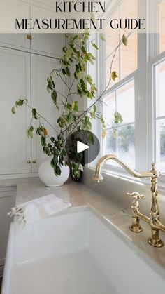 the kitchen measurement guide is displayed in front of a white sink with gold faucets