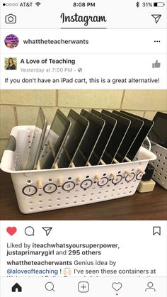 a white plastic basket filled with lots of black and white items on top of a wooden table