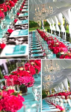 the table is set with red flowers and candles