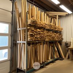 several stacks of wooden planks in a storage area