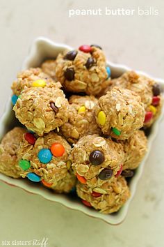 a bowl filled with cookies and candy balls