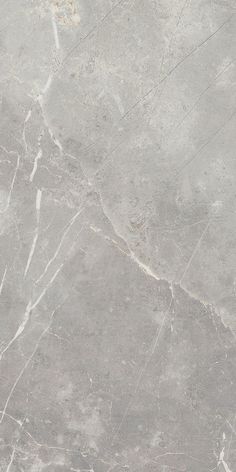 a gray marble floor with white lines on it