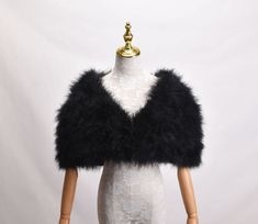 Description Commodity: Real Ostrich Feather Fur Shawl Wraps Cape Bride Wedding Party Accessories Material: Really Ostrich Feather ; Satin Silk Cloth+Thin Silk Lining;   Size: The Shawl long 132cm; Fur sides width 40cm; (Because it is handmade, size error 1-2cm)  Color : Grey/Black; Wear: There are two hooks on the inner lining, which is very convenient to fix and wear! Friendship Reminder: 1.Due to the different monitors setting and light effect, the product colors may display slightly differenc Black Wear, Fur Shrug, Wedding Party Accessories, Arab Wedding, Women Bride, Fur Shawl, Scarf Casual, Ostrich Feather, Ostrich Feathers