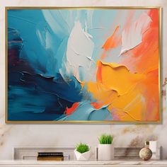 an abstract painting hangs on the wall above a fireplace mantel in a living room