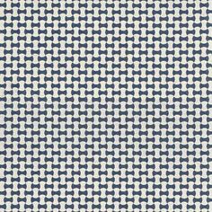 a blue and white pattern with small squares on it's surface, in the middle of