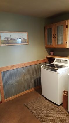 a washer and dryer in a small room