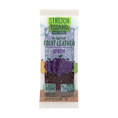 organic fruit leather wrapper with grape and kiwi on the inside, in front of a white background