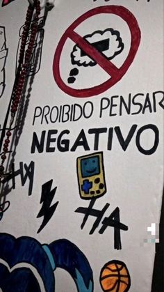 a sign with graffiti written on it that says proibibido pensante negattivvo