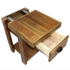 a small wooden table with drawers on the bottom and one drawer open to reveal something