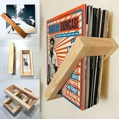 a wall mounted shelf with various records on it