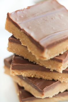 chocolate and peanut butter bars stacked on top of each other