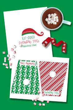 two christmas cards with candy canes and marshmallows on them next to a cup of hot chocolate