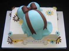 a birthday cake with a bow on top