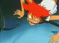 an anime character with red hair falling off his head and holding onto another character's leg